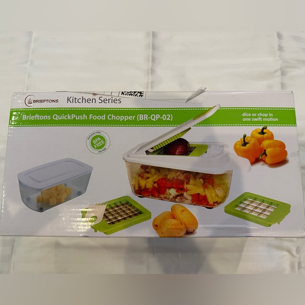 Kitchen quick push food chopper. New, never opened.